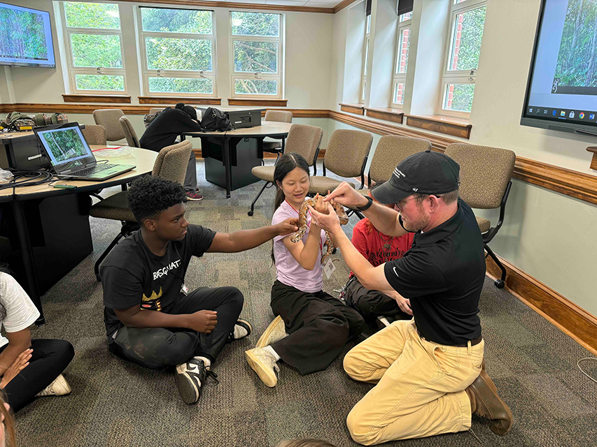 Student learn to teach with animals
