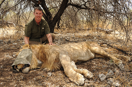 Jim Beasley with lion