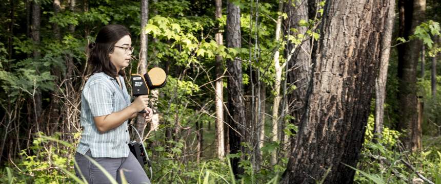 Allison Sheeks uses LiDAR in a forest