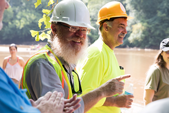Jay Shelton stands in construction gear at White Dam