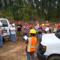 Students gather during forestry field camp to learn about a logging operation.