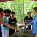 Holly Campbell shows students how to ID leaves