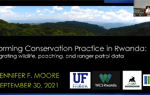 Presentation slide titled Informing Conservation Practice in Rwanda by Jennifer F. Moore, dated September 30, 2021, with logos and an image of a forested landscape.